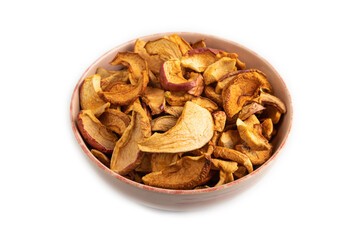 Dried Apples in ceramic bowl isolated on white. Side view, close up