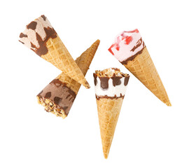 Four delicious ice cream cones falling on transparent background