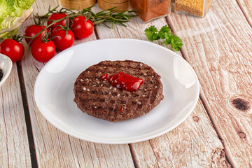 Grilled juicy beef cutlet for burger