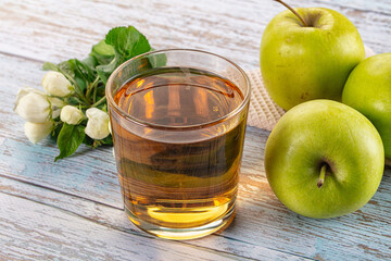 Apple yellow juice in the glass