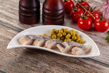 Slided marinated salted herring fillet