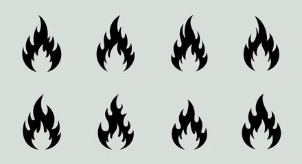 Naklejka premium Dynamic Flame Icons: A collection of dynamic flame icons dances on the gray background, representing the elemental power and symbolic energy of fire. This striking image conveys warmth, passion.