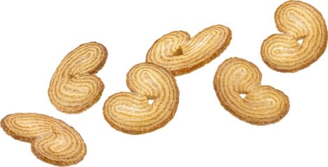 Falling french palmier cookies isolated on white background