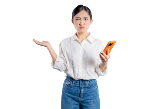 A confident young Asian woman with her arms crossed presents to the side with an open palm, smiling warmly as she introduces a product, service, or idea in the copy space.
