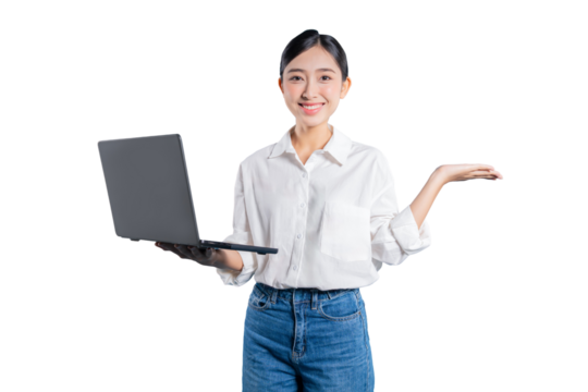 Asian woman in a casual outfit holds a laptop and gestures with an open palm, as if presenting a project, website, or introducing an idea against a png background.
