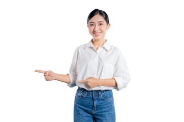 Asian woman in a casual outfit uses both index fingers to point to the side, enthusiastically directing attention to something in the copy space with a bright smile.
