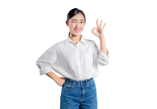 Asian woman in a casual outfit winks and makes an "OK" gesture with one hand on her hip, signifying that everything is perfect, approved, or a secret well kept.
