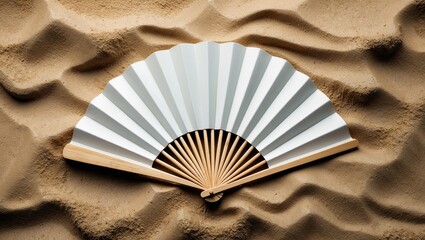 Minimalistic white fan with bamboo outline on sand background, vintage paper texture for traditional design themes