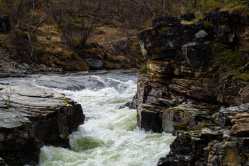 water crashing on rocks river in Abisko
