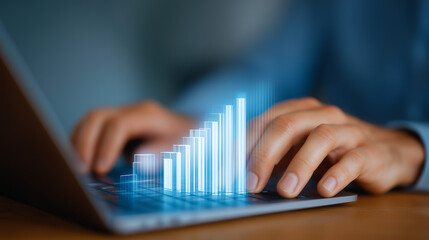 Hands on Laptop with Financial Growth Chart in Digital Background