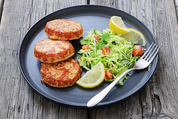 Hot Smoked salmon burgers, patties and coleslaw