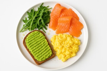 Keto morning meal featuring avocado on toast with smoked fish, scrambled eggs, and arugula, flat lay on a white surface