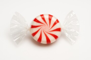 Wrapped peppermint candy isolated on white background