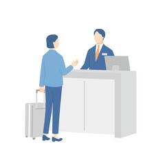 受付カウンターで女性客を案内する男性スタッフ