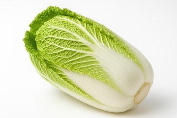 Close-up of fresh Peking cabbage against a plain white backdrop