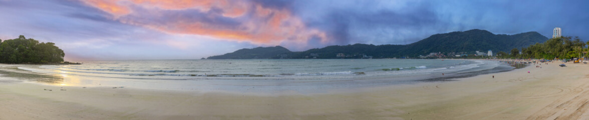 Beautiful and colourful Panorama of Patong Beach at Sunset on the romantic island of Phuket Thailand