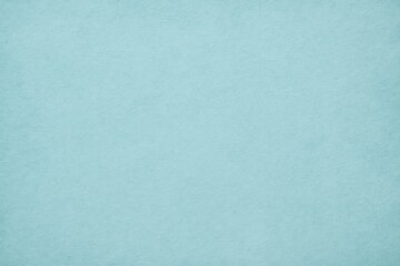 Vintage eco-inspired kraft paper texture with gentle white illumination and teal accents, ideal for wallpaper designs and wall decor in pastel cyan hues.
