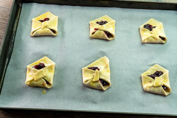Envelopes from dough with jam. Puff pastry. Dessert