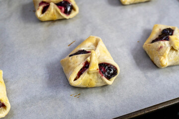 Envelopes from dough with jam. Puff pastry. Dessert