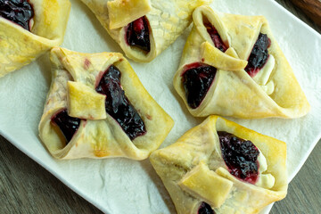 Envelopes from dough with jam. Puff pastry. Dessert