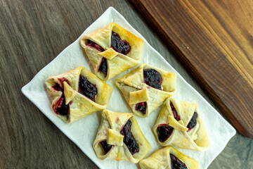 Envelopes from dough with jam. Puff pastry. Dessert