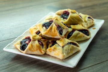 Envelopes from dough with jam. Puff pastry. Dessert