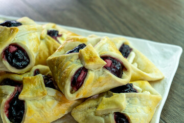 Envelopes from dough with jam. Puff pastry. Dessert