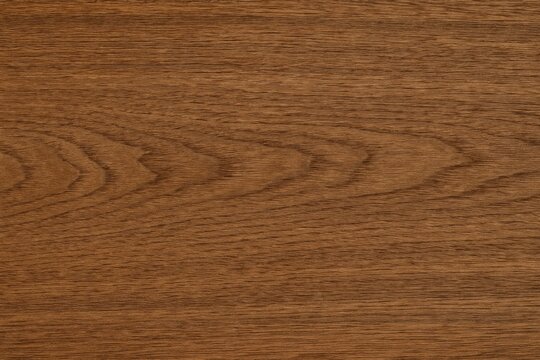 Background featuring a natural brown wood grain pattern with vintage lighting effects