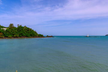 Turquoise blue waters and Lush green islands of the coast of Cape Panwa located on the eastern side of Phuket island in Thailand