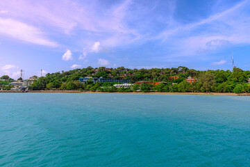 Turquoise blue waters and Lush green islands of the coast of Cape Panwa located on the eastern side of Phuket island in Thailand