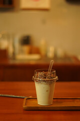 Closeup of Iced Caramel Macchiato at the coffee shop, Caramel Macchiato is a classic macchiato...