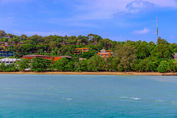 Turquoise blue waters and Lush green islands of the coast of Cape Panwa located on the eastern side of Phuket island in Thailand