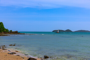 Turquoise blue waters and Lush green islands of the coast of Cape Panwa located on the eastern side of Phuket island in Thailand