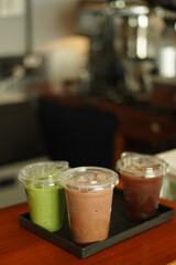 Closeup of Iced Caramel Macchiato at the coffee shop, Caramel Macchiato is a classic macchiato...
