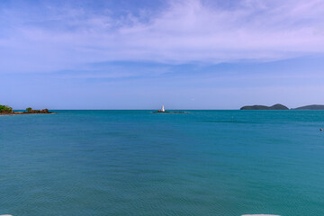 Fototapeta premium Turquoise blue waters and Lush green islands of the coast of Cape Panwa located on the eastern side of Phuket island in Thailand