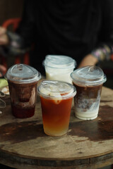 Closeup of Iced Caramel Macchiato at the coffee shop, Caramel Macchiato is a classic macchiato...