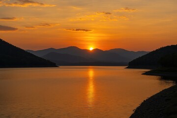 Evening glow over a water reservoir in northern Thailand