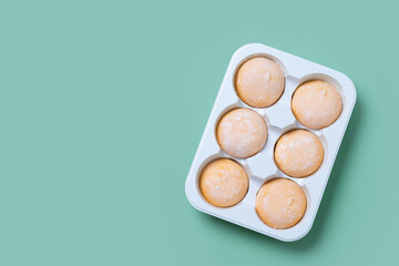Japanese Mango ice cream mochi on green background. Top view. Copy space