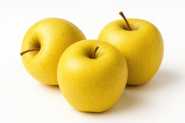 Three vibrant yellow apples on display