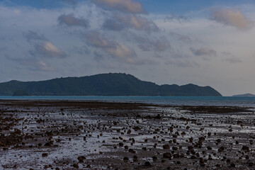 Sunset Beautiful view from Kao Khad next to Cape Panwa on the island of Phuket Thailand. Views of the turquoise Blue waters of the Andaman Sea and small islands off the coat of Phuket