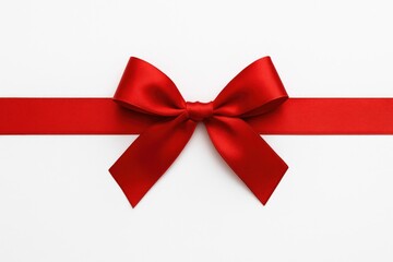 Fototapeta premium White background featuring a solitary red bow