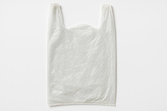 Eco-friendly handle plastic bag on a plain white surface. Recyclable plastic waste repurposed into pellets for commercial use.