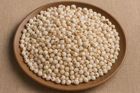 Plate of puffed sorghum, jawar, or lahya - a traditional Indian grain preparation