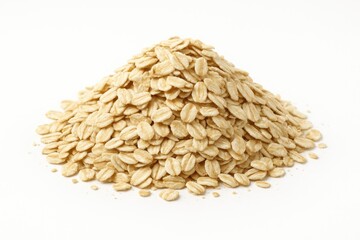 Uncooked oats displayed on a plain white backdrop