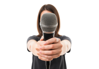 A young woman with long brown hair holds a microphone in front of her. She wears a black shirt. The background is transparent.