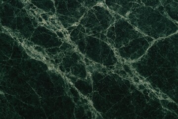 Close-up of serpentinite mineral with intricate pattern on a deep green background