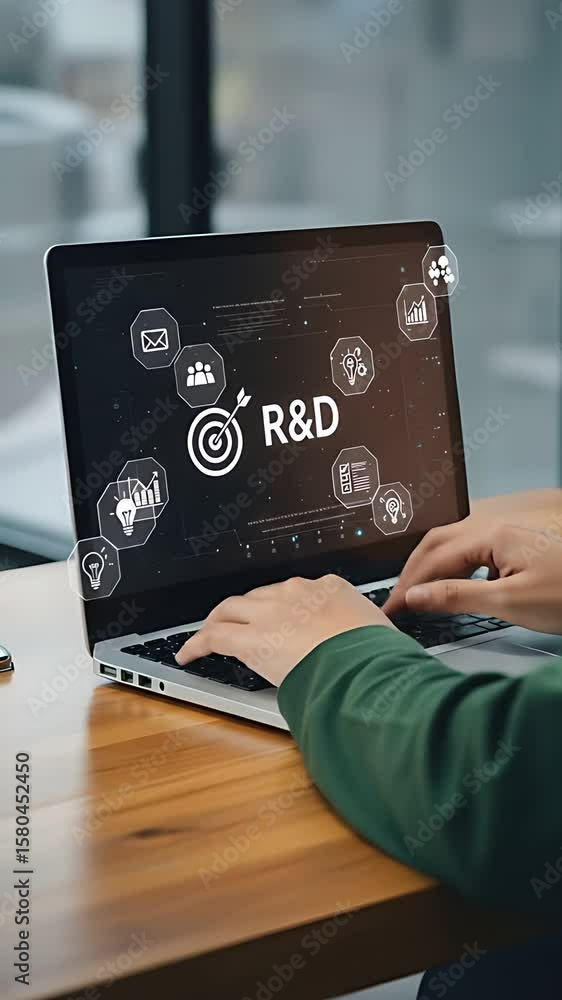 Aufkleber r&d on laptop: an entrepreneur focuses on research and development using a computer to innovate idea