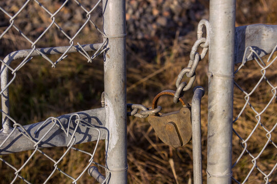 Metal industrial gate chained and locked shut