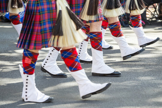 Marching feet of a highland pipe band