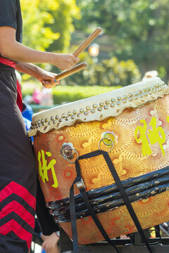 A drummer playing a large Chinese drum